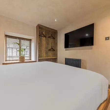 Hébergement de vacances Quirky Retreats - The Coach House *